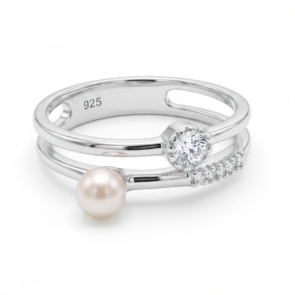 Anillo de plata 925 con diseño abierto, detalle perlado, piedra brillante y destellos laterales