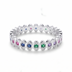 Anillo eternity de plata 925 con piedras multicolor y diseño delicado