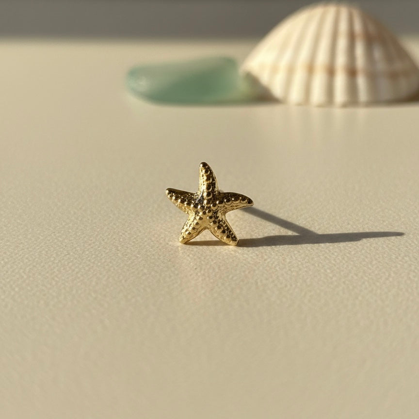 Arete estrella de mar mini de plata 925 bañada en oro 18K