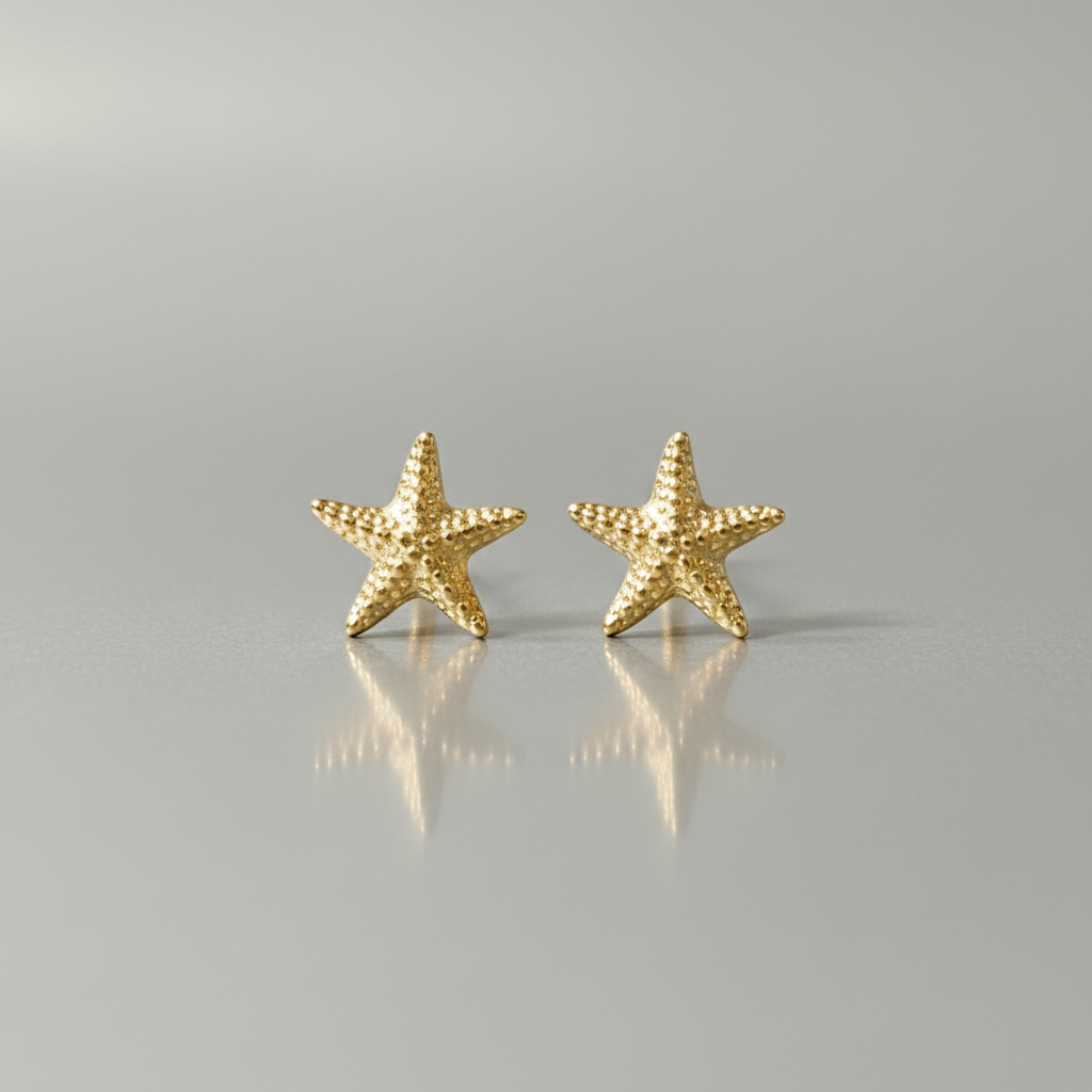 Aretes estrella de mar mini de plata 925 bañados en oro 18K