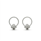 Aretes flor halo de plata 925 con aro circular texturizado