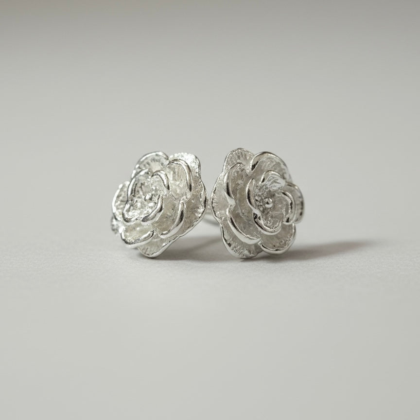 Aretes flor mini de plata 925