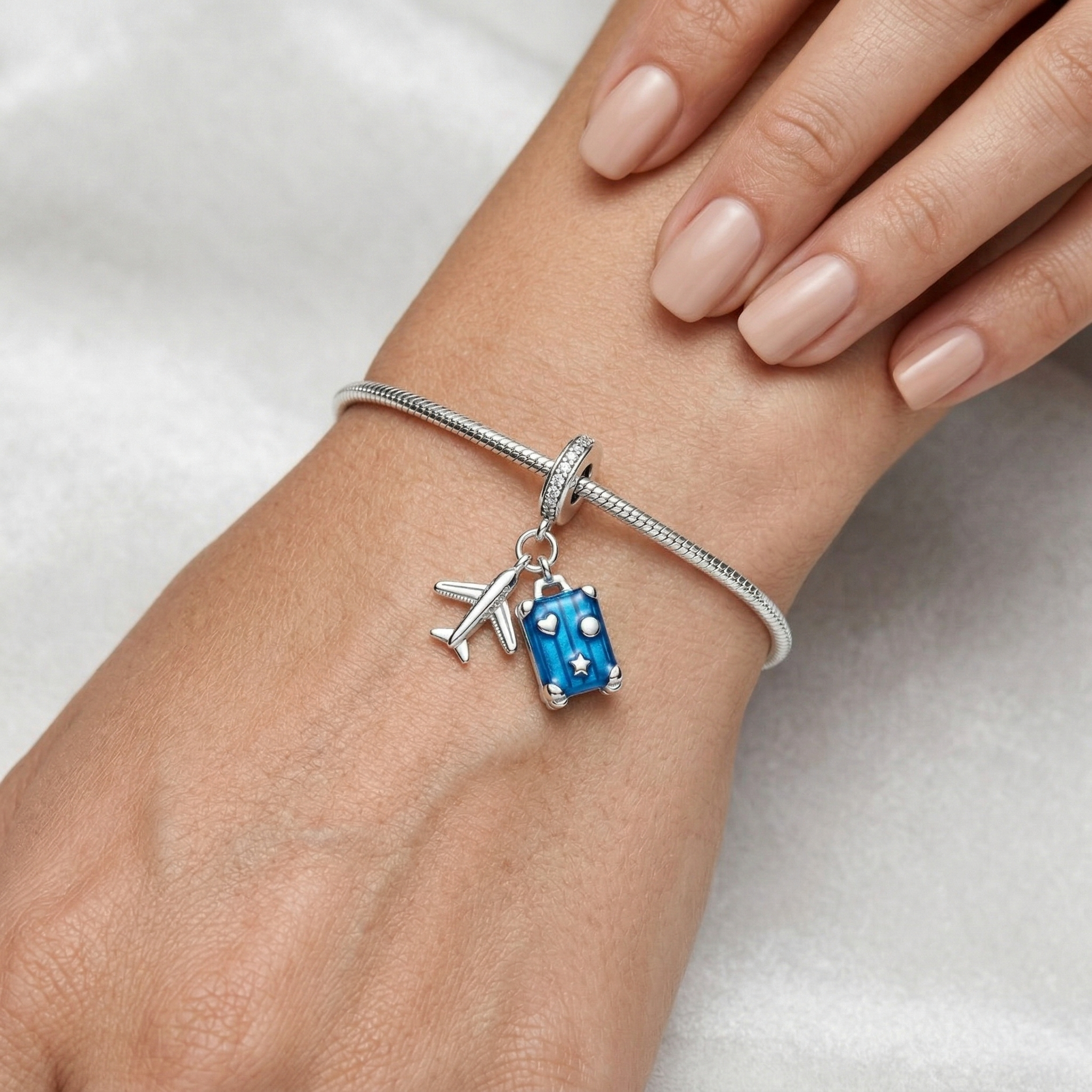 Charm viaje soñado de plata 925 colocado en pulsera