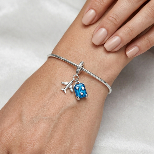 Charm viaje soñado de plata 925 colocado en pulsera