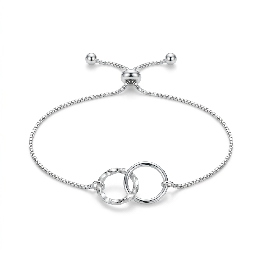 Pulsera Emilia Plateada ajustable en Plata 925 con dos aros entrelazados | Emmas