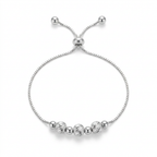 Pulsera Plata 925 que combina pequeñas esferas lisas con tres piezas centrales texturizadas