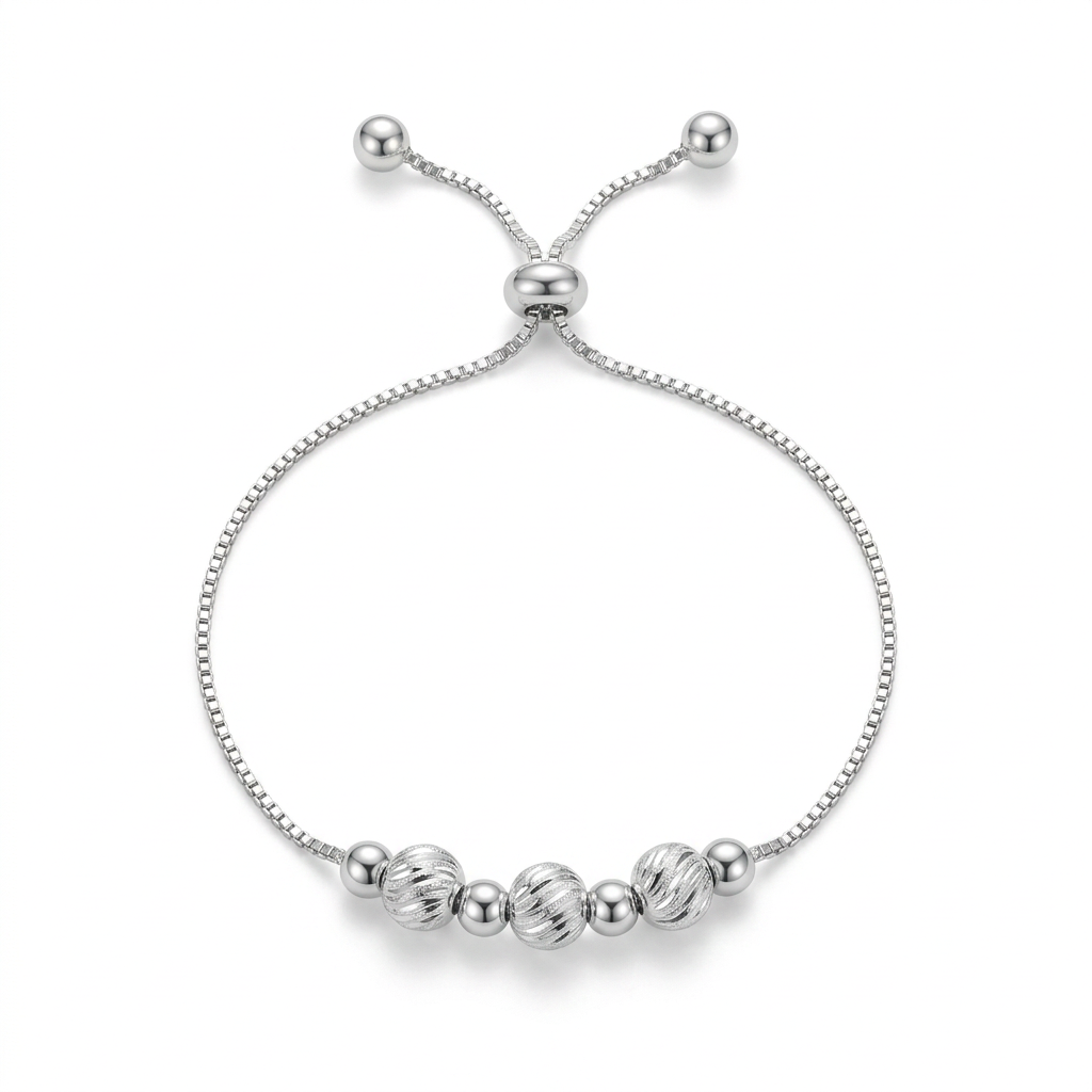 Pulsera Plata 925 que combina pequeñas esferas lisas con tres piezas centrales texturizadas
